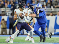 Chicago Bears quarterback Justin Fields (1) looks to pass the ball during  an NFL  football game between the Detroit Lions and the Chicago B...