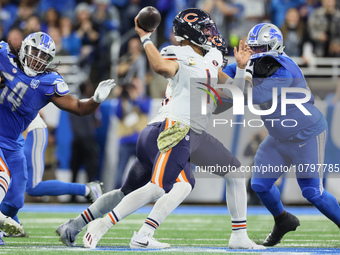 Chicago Bears quarterback Justin Fields (1) looks to pass the ball during  an NFL  football game between the Detroit Lions and the Chicago B...
