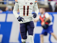 Chicago Bears wide receiver Darnell Mooney (11) runs on the field after a play during  an NFL  football game between the Detroit Lions and t...