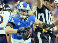 Detroit Lions linebacker Alex Anzalone (34) runs with the ball during  an NFL  football game between the Detroit Lions and the Chicago Bears...