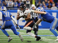 Chicago Bears running back Roschon Johnson (23) runs the ball during the second half of an NFL football game between the Chicago Bears and t...