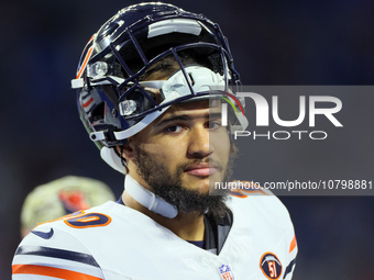 Chicago Bears running back Travis Homer (20) looks down the field ahead of an NFL  football game between the Detroit Lions and the Chicago B...