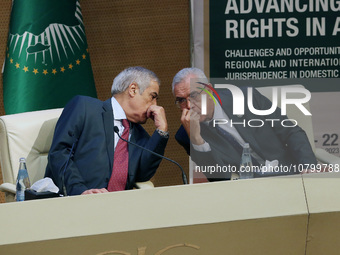 Algerine Prime Minister Nadir Larbaoui (L), Abderrachid TABI Algerian Minister of Justice (R), during the launch of the sixth African judici...