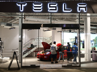 Tesla logo is seen at the showroom in Santa Monica, United States on November 12, 2023. (