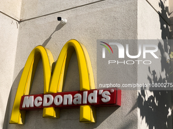 McDonald's logo is seen near the restaurant in Santa Monica, United States on November 13, 2023. (