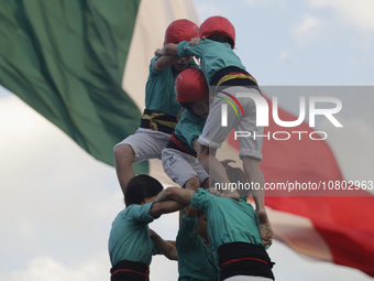 The Castellers de Vilafranca from Catalonia are performing in the Zocalo of Mexico City, presenting the creation of human towers, a unique c...
