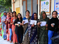 Women are standing in line to cast their votes for the Rajasthan Assembly elections in Jaipur, Rajasthan, India, on November 25, 2023. (