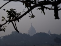 The Victoria Memorial Hall is seen through a haze as air pollution levels rise in Kolkata, India, on November 27, 2023. (