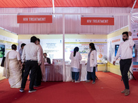 People are visiting an HIV treatment stall during an event to mark World AIDS Day in Guwahati, Assam, India, on December 1, 2023. (