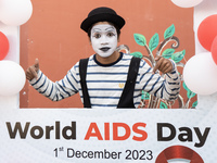 A mime artist is posing for a photograph during an event to mark World AIDS Day in Guwahati, Assam, India, on December 1, 2023. (