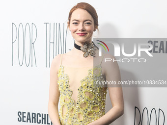 American actress and producer Emma Stone wearing Louis Vuitton arrives at the New York Premiere Of Searchlight Pictures' 'Poor Things' held...