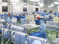Workers are making medical infusion sets for export at a workshop in Huai'an City, Jiangsu Province, China, on December 14, 2023. (