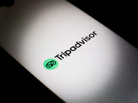 The Tripadvisor logo is being displayed on a smartphone screen in Athens, Greece, on December 24, 2023. (
