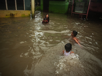 Children and adults are experiencing the daily challenges of life as the Deli River, often burdened by floods, continues to affect the local...