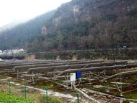 A photovoltaic power station is being seen in a mountain village in Yichang, Hubei province, China, on December 25, 2023. According to the l...