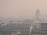 A photo taken on December 27, 2023, shows a hazy day in Xi'an, Shaanxi Province, China. (