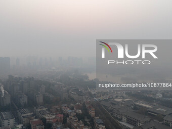 A photo taken on December 28, 2023, shows a hazy day in Xi'an, Shaanxi Province, China. (