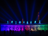 Visitors are attending the 2nd International Light and Shadow Art Festival at the Fine Arts Park in Chongqing, China, on December 29, 2023....