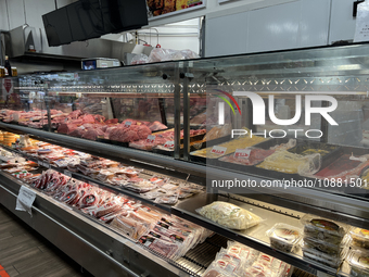 Meat is on display at a grocery store in Richmond Hill, Ontario, Canada, on September 23, 2023. Rising housing costs and an 11.4 percent inc...