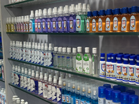 Hand sanitizer is being displayed at a shop that sells face masks, hand sanitizer, and other personal protective equipment to help protect a...