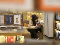 Readers are shopping for books at Jinchuang Book Mall in Nanjing, China, on December 31, 2023. (
