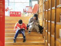 Readers are shopping for books at Jinchuang Book Mall in Nanjing, China, on December 31, 2023. (