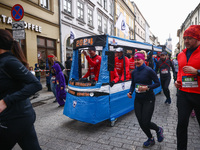 People dressed in funny costumes attend the traditional 19th Krakow New Year's Run in the Old Town in Krakow, Poland on December 31, 2023. T...