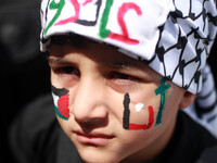Palestinians during a rally to mark the anniversary of 66 for 