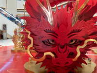 An installation for the Year of the Dragon is being displayed inside the BFC Bund Financial Center in the Huangpu district of Shanghai, Chin...
