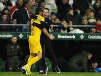 Ferran Torres left winger of Barcelona and Spain celebrates after scoring his sides third goal with Xavi Hernandez head coach of Barcelona d...