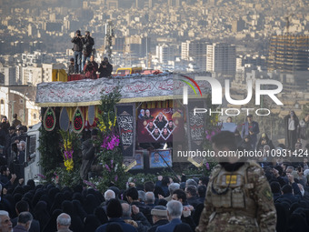 A truck is carrying the coffins containing the bodies of Sadegh Omidzadeh, Head of the Islamic Revolutionary Guard Corps' (IRGC) Quds Force...