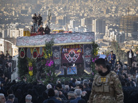 A truck is carrying the coffins containing the bodies of Sadegh Omidzadeh, Head of the Islamic Revolutionary Guard Corps' (IRGC) Quds Force...