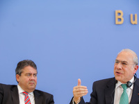 German Economy Minister and Vice Chancellor Sigmar Gabriel meets OECD Secretary General Jose Angel Gurria a press conference on May 13, 2014...