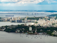 A panoramic view is being seen from the City Park in Niteroi, showcasing the city of Niteroi on the right and the bridge that connects to Ri...