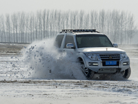 An off-road enthusiast is driving on the Liaohe Beach in Kangping County, Shenyang, China, on January 21, 2024. (