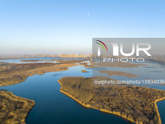 An urban ecological landscape is being showcased at Xishuanghu Wetland Park in Lianyungang, China, on January 23, 2024. (