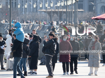 Tourists are visiting the Bund scenic area in Shanghai, China, on January 23, 2024. (