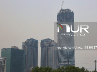 High-rise buildings are under construction in Greater Noida, Uttar Pradesh, India, on May 3, 2022. (