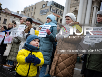 Participants are picketing outside the Lviv National Academic Opera and Ballet Theater named after Solomiia Krushelnytska in Lviv, Ukraine,...