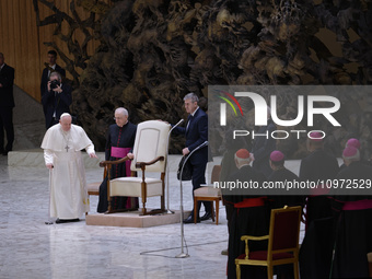 Pope Francis is arriving in the Paul VI hall for the weekly general audience at the Vatican, on February 7, 2024. (
