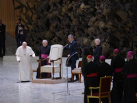 Pope Francis is arriving in the Paul VI hall for the weekly general audience at the Vatican, on February 7, 2024. (