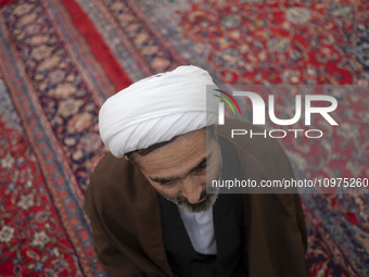 An Iranian cleric is participating in a turban-wearing ceremony at a seminary in the holy city of Qom, 145 km (90 miles) south of Tehran, on...