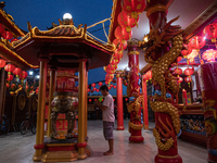 Indonesians of Chinese descent are offering prayers on the eve of the Lunar New Year at the Hok Lay Kiong Temple in Bekasi, Indonesia, on Fe...