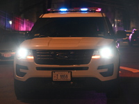 A police vehicle is at the crime scene where police are involved in a shooting in Washington, D.C., United States, on February 9, 2024. Offi...