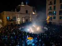 Fireworks are illuminating the bonfire of St. Conrad in Dante Square, Molfetta, Italy, on February 9, 2024, to celebrate the patron saint St...