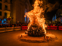 A bonfire is being lit in honor of St. Conrad, the patron saint of Molfetta, in Dante Square, Molfetta, Italy, on February 9, 2024. This eve...