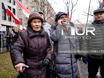 A 101 year old Wanda stand with her family during demonstration, led by far right media - Gazeta Polska and TV Republica and Law and Justice...