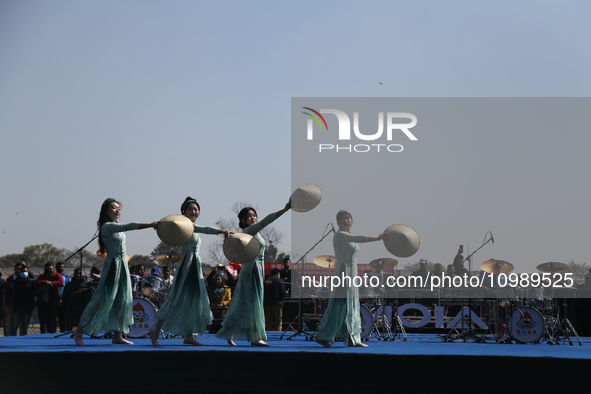 Chinese artists are performing a cultural dance in Kathmandu, Nepal, on February 12, 2024, to celebrate Chinese New Year at a culture fair a...
