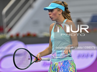 Magdalena Frech of Poland is reacting during her first-round match against Victoria Azarenka of Belarus at the WTA 1000-Qatar TotalEnergies...