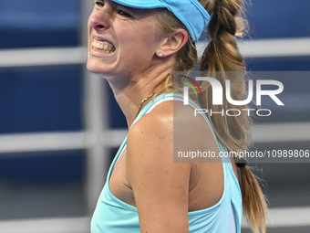 Magdalena Frech of Poland is reacting during her first-round match against Victoria Azarenka of Belarus at the WTA 1000-Qatar TotalEnergies...